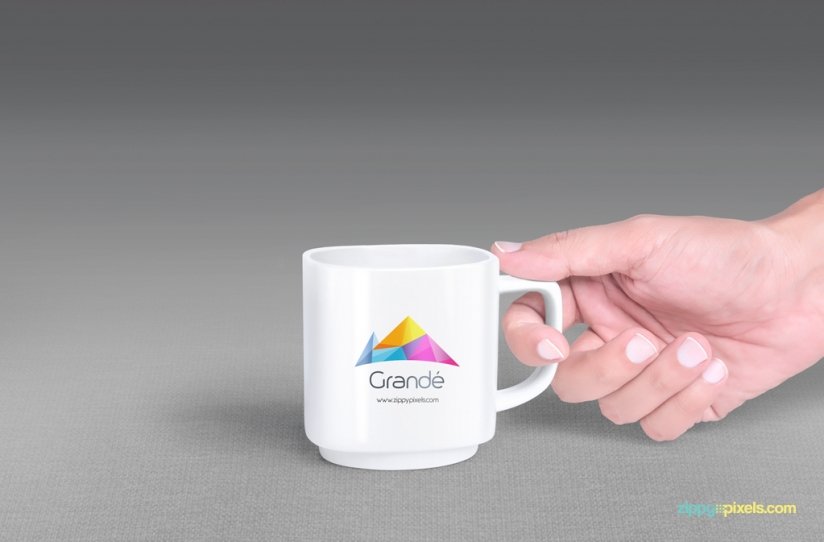 FREE MUG MOCKUP WITH 7 UNIQUE HOLDING POSITIONS by ZippyPixels